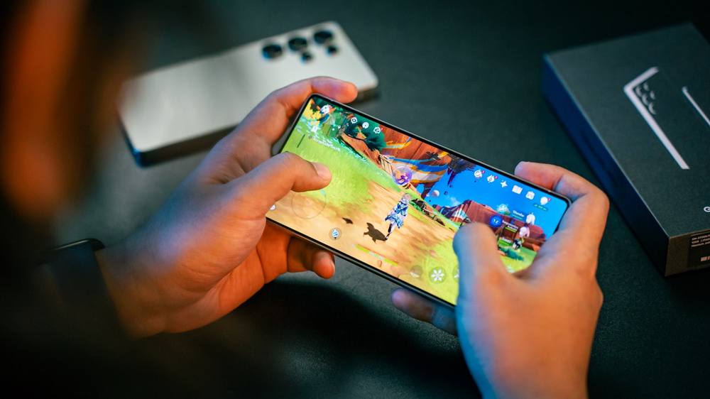 A person is playing a game on their phone